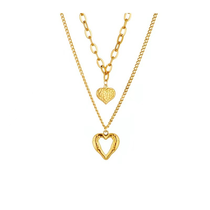 **Love Necklace Gift Set – Stylish & Elegant**  

A beautiful **2-piece necklace set** featuring **heart-shaped** and **geometric pendants** made from **high-quality titanium steel**. Available in **silver** and **golden** colors, with **gold inlaid treatment** for a luxurious finish. The **O-shaped chain** adds comfort and style, perfect for women who love elegant, **Korean-style** accessories.