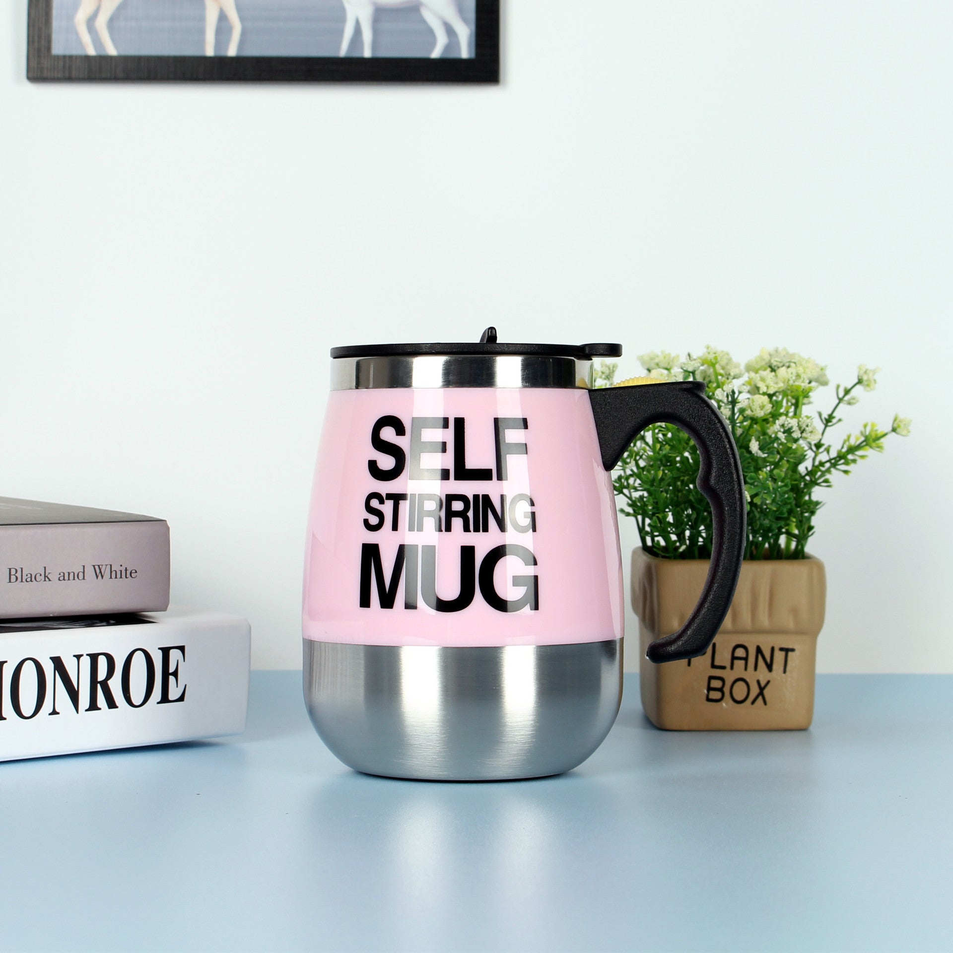 "Electric Self-Stirring Coffee Mug – A convenient, one-touch self-mixing mug with a 401-500ml capacity, available in multiple vibrant colors. Perfect for coffee, tea, and hot chocolate lovers at home or on the go."