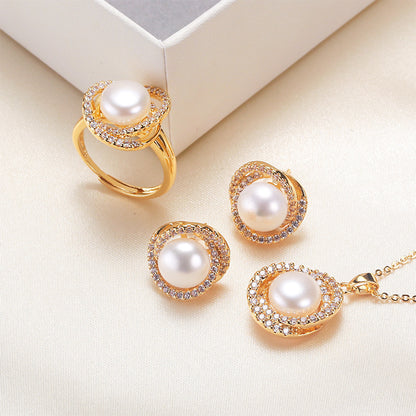 Elegant pearl necklace, ring, and earrings set in various color options, featuring timeless designs and luxurious craftsmanship