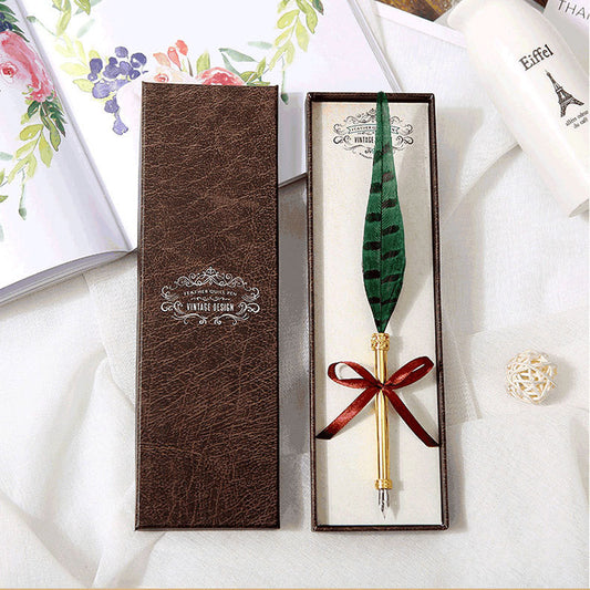 **Elegant Retro Feather Pen Gift Set – Vintage Writing Experience**  

A beautifully crafted **stainless steel feather pen** set in a stylish **gift box**, perfect for writers, calligraphy enthusiasts, and collectors. Timeless design meets smooth writing for an unforgettable experience. Ideal for gifting on any occasion! 🎁✒️