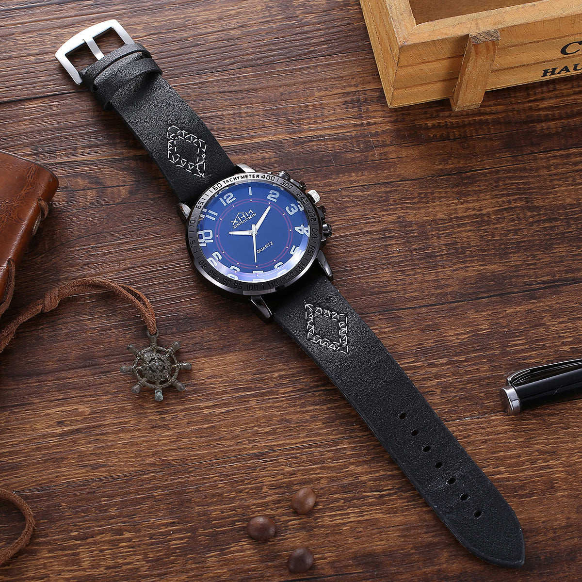 A men's fashion boutique gift set including a stylish quartz watch, belt, key chain, and glasses in a sleek packaging. Ideal for a modern, casual look.