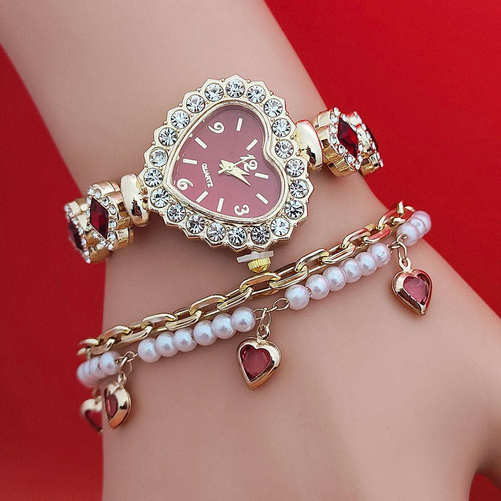 **Love Shape Watch Set – Stylish & Elegant 💖** A **quartz movement** watch with a **unique love shape design**, available in **Red**, **Green**, and **Black**. Featuring **alloy strap** and **stainless steel** watch bottom for durability. A versatile piece, worn as both a **watch** and **bracelet**. ✨
