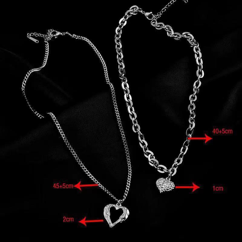 **Love Necklace Gift Set – Stylish & Elegant**  

A beautiful **2-piece necklace set** featuring **heart-shaped** and **geometric pendants** made from **high-quality titanium steel**. Available in **silver** and **golden** colors, with **gold inlaid treatment** for a luxurious finish. The **O-shaped chain** adds comfort and style, perfect for women who love elegant, **Korean-style** accessories.