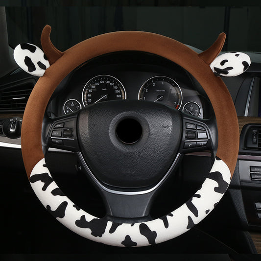 Plush cute car steering wheel cover made from soft short plush material, providing a comfortable and breathable grip. Fits most steering wheels with a 38cm diameter, suitable for all seasons.