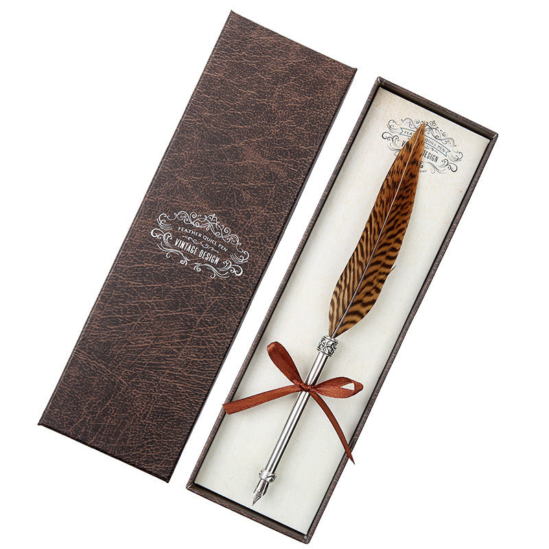 **Elegant Retro Feather Pen Gift Set – Vintage Writing Experience**  

A beautifully crafted **stainless steel feather pen** set in a stylish **gift box**, perfect for writers, calligraphy enthusiasts, and collectors. Timeless design meets smooth writing for an unforgettable experience. Ideal for gifting on any occasion! 🎁✒️