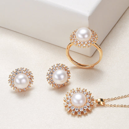 Elegant pearl necklace, ring, and earrings set in various color options, featuring timeless designs and luxurious craftsmanship