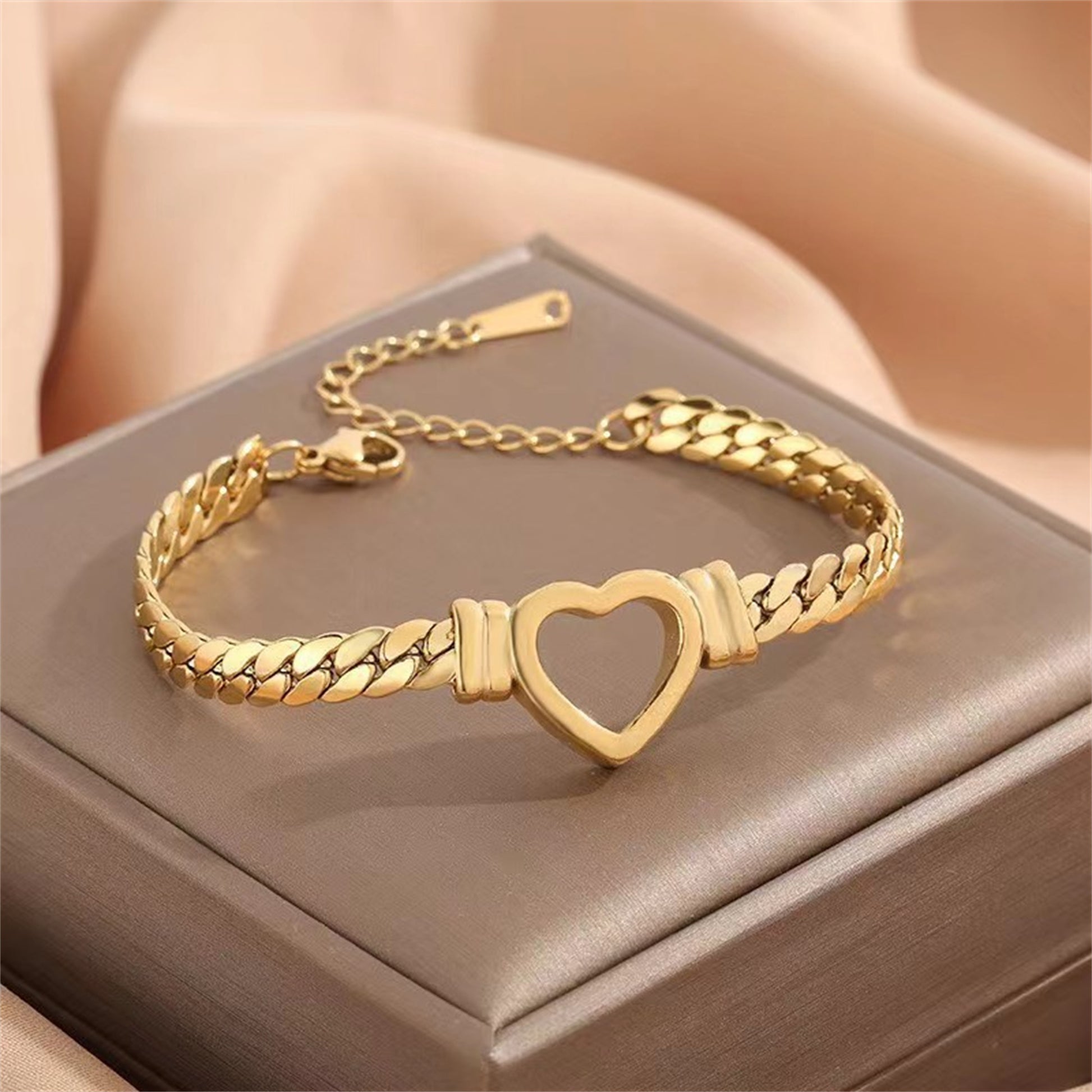 **Love Necklace & Bracelet** – Elegant **heart-shaped jewelry** with a sleek **Cuban chain**. Made from **stainless steel** with an **electroplated finish**, it's stylish, durable, and comfortable to wear. Perfect for any occasion or as a heartfelt gift. 💖