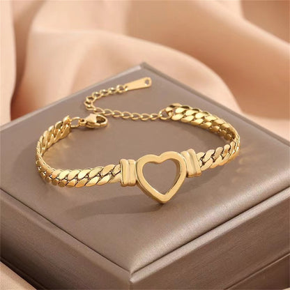 **Love Necklace & Bracelet** – Elegant **heart-shaped jewelry** with a sleek **Cuban chain**. Made from **stainless steel** with an **electroplated finish**, it's stylish, durable, and comfortable to wear. Perfect for any occasion or as a heartfelt gift. 💖