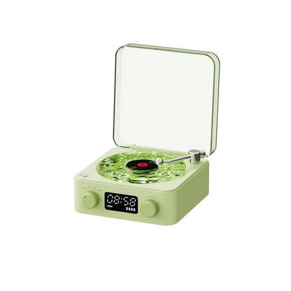 **Retro Turntable Bluetooth Speaker – Vintage Style, Modern Sound 🎶** A portable Bluetooth speaker (142x153x67mm) with a retro design, offering 4 soothing nature sounds like ocean waves and birds. Features 360° surround sound, multiple playback options (Bluetooth, AUX, TF card), and a beautiful breathing light with a transparent turntable. Perfect for parties, relaxation, or enhancing your bedroom ambiance. Available in **blue** and **green**. 🎵