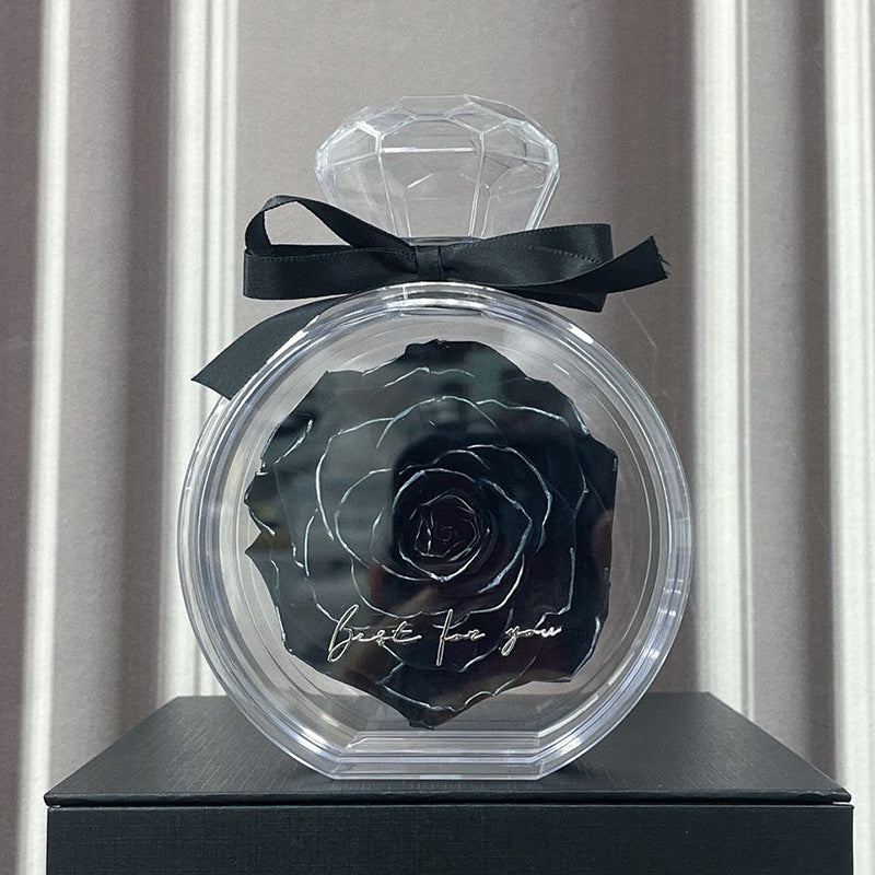 **Rose Gift Box Home Decor – Elegant & Charming 🌹** A stylish **dried flower** arrangement in a **plastic bottle**, available in colors like **Red**, **Pink**, **Sapphire Blue**, and more. Perfect for **Valentine's Day**, **Mother's Day**, and other special occasions. **10x6x14cm**. 🎁