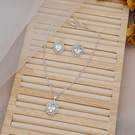 Water Drop Necklace and Earrings Set – Elegant alloy set featuring rhinestone pendant and gold-plated artificial gems. Perfect for weddings, travel souvenirs, and special gifts