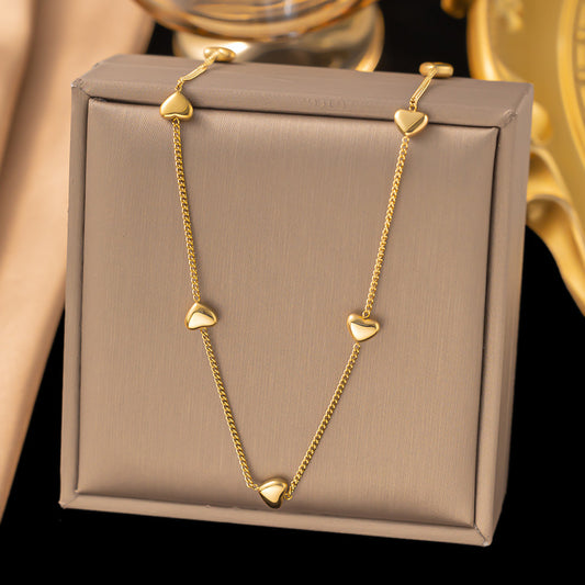 Add a touch of romance and elegance to your jewelry collection with the Sweet Elegance Titanium Steel Necklace &amp; Peach Heart Bracelet. Designed for the modern woman, this set is a beautiful blend of geometry and love-inspired elements, perfect for any occasion.
