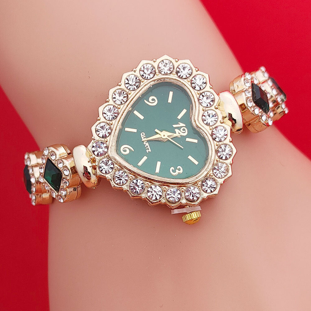 **Love Shape Watch Set – Stylish & Elegant 💖** A **quartz movement** watch with a **unique love shape design**, available in **Red**, **Green**, and **Black**. Featuring **alloy strap** and **stainless steel** watch bottom for durability. A versatile piece, worn as both a **watch** and **bracelet**. ✨