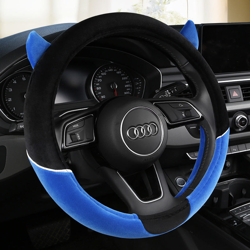 Cute cartoon plush steering wheel cover designed for all seasons, providing comfort and warmth. Fits most car models and adds a playful touch to your car's interior.