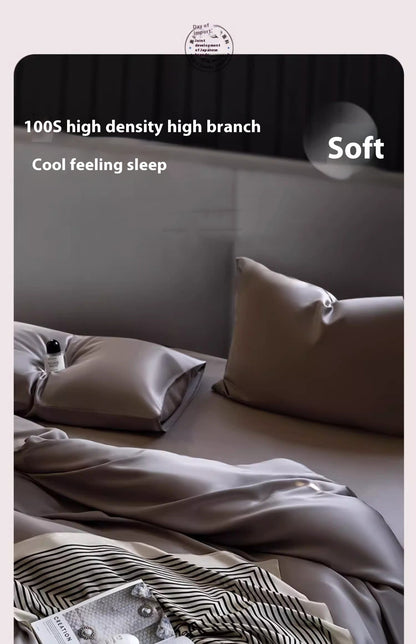 Luxuriously soft Four-Piece Ice Silk Bed Sheets made from breathable Lyocell fiber (Tencel). Features a modern minimalist design, reactive dyeing for long-lasting color, and a silky-smooth texture for year-round comfort. Available in multiple sizes.