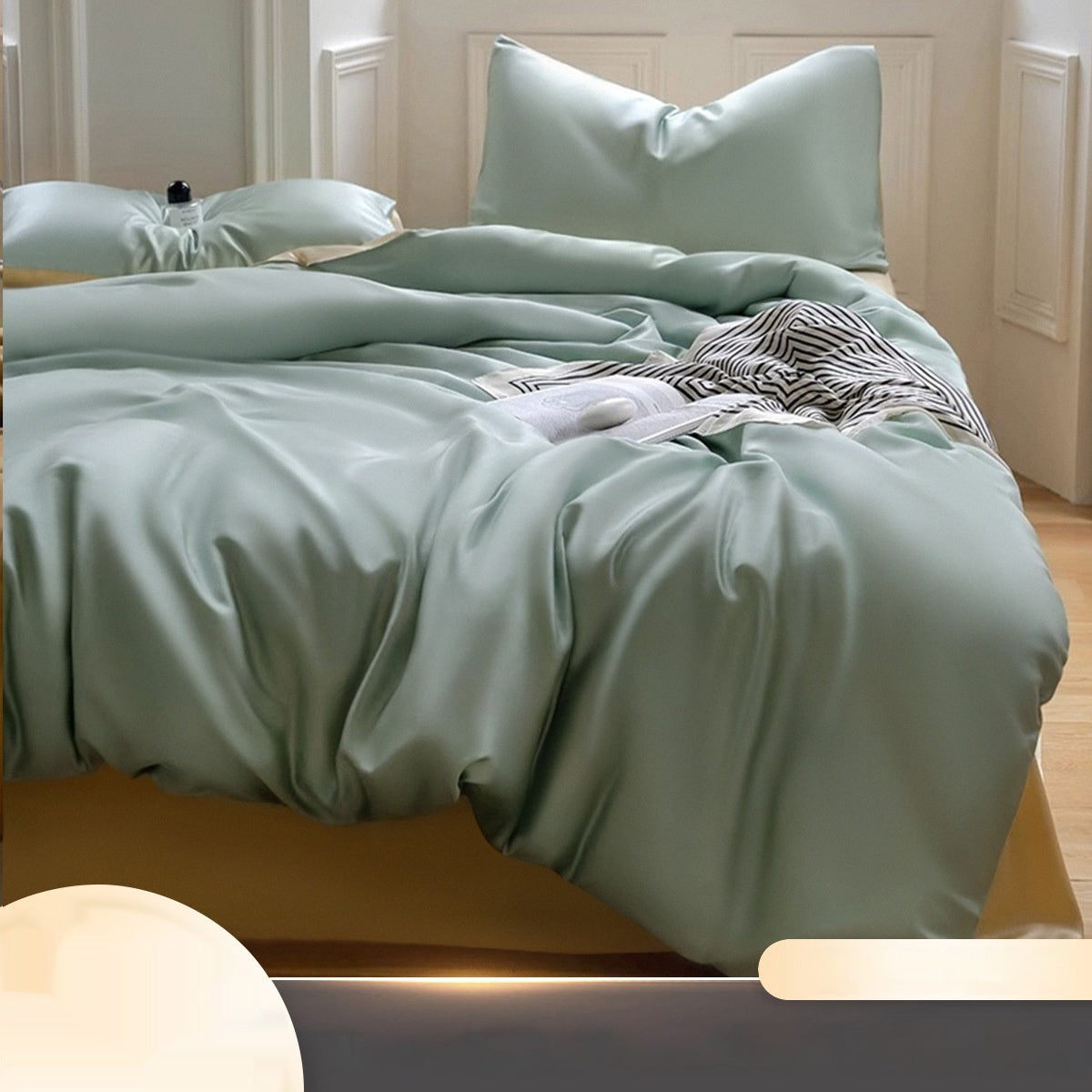 Luxuriously soft Four-Piece Ice Silk Bed Sheets made from breathable Lyocell fiber (Tencel). Features a modern minimalist design, reactive dyeing for long-lasting color, and a silky-smooth texture for year-round comfort. Available in multiple sizes.